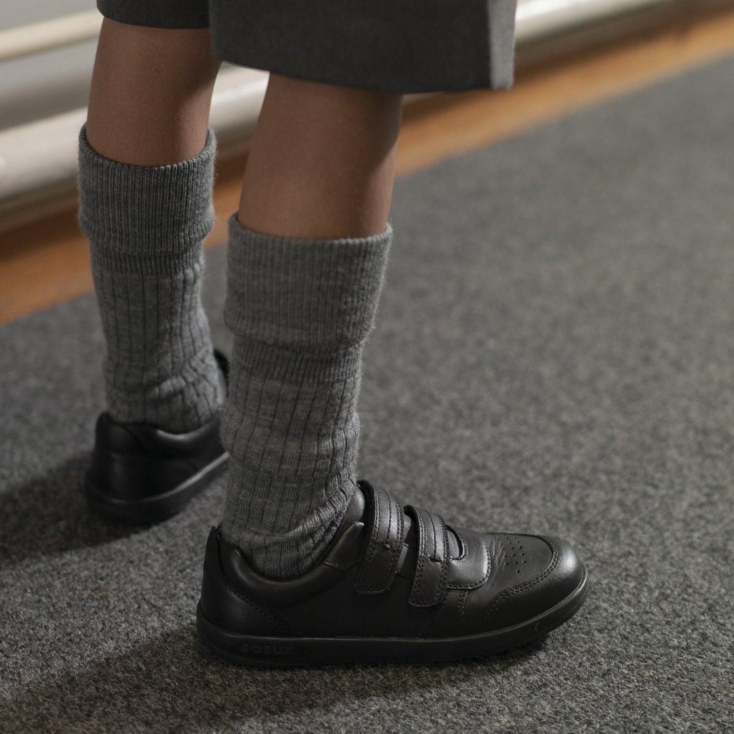 Bobux Kids Plus Leap Black School Shoe in use 3